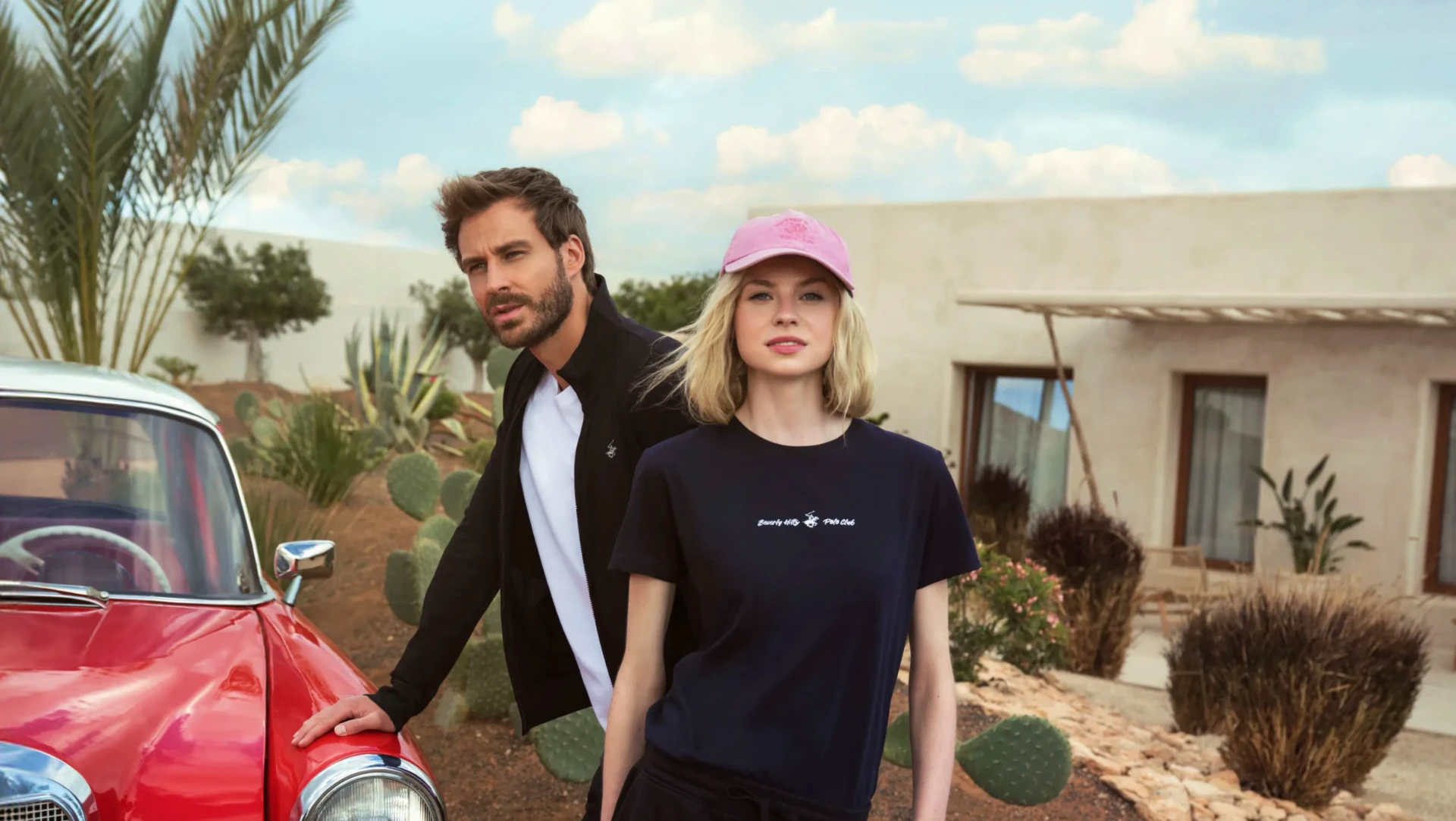 Beverly Hills Polo Club editorial with two models beside a red vintage car, a Google Ads and Shopping client.